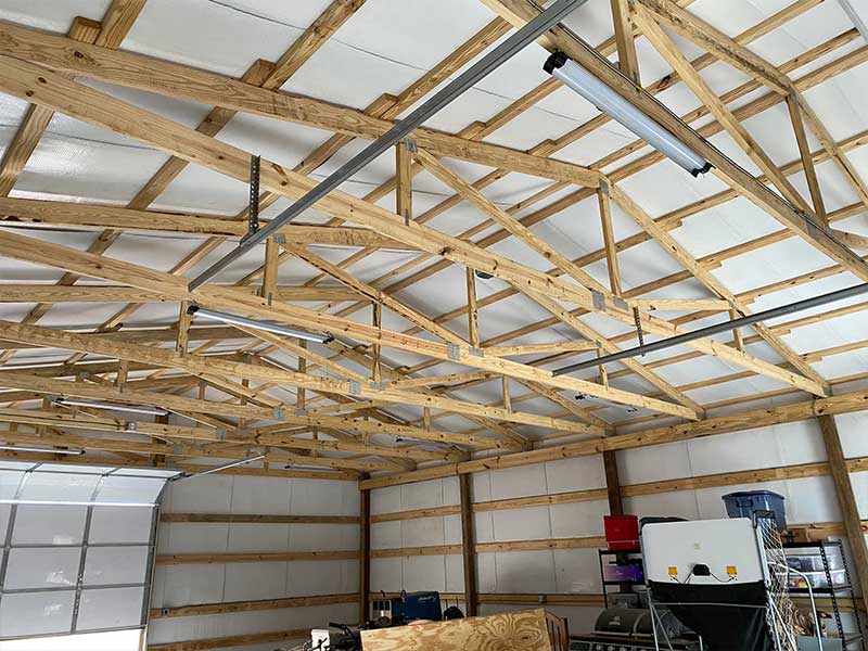 photo showing the interior wood frame ceiling and new electric panel